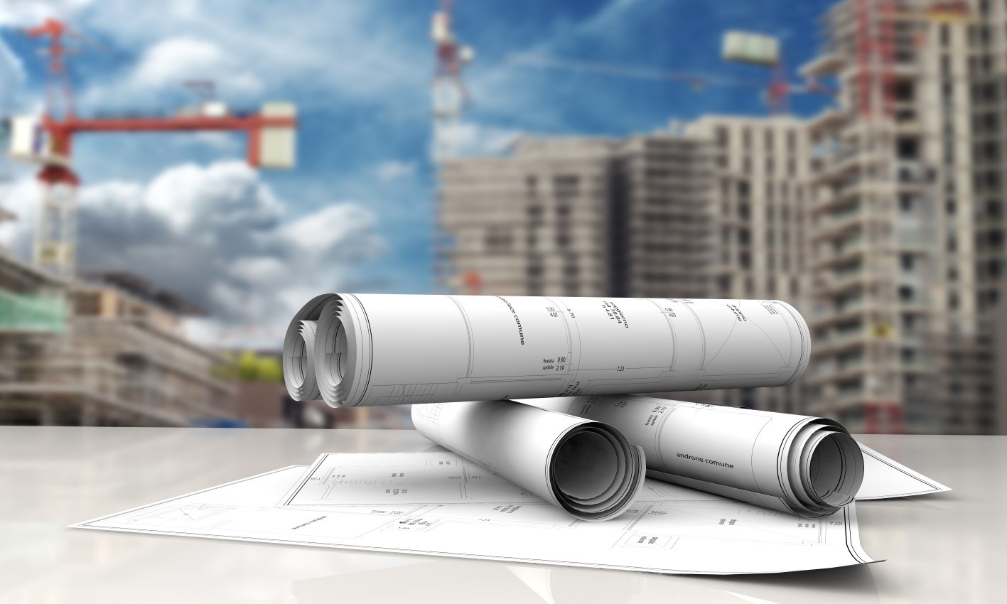 technical blueprints on white table in a construction site